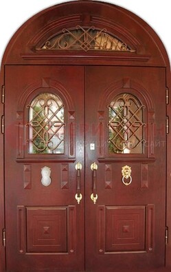 Стальная арочная дверь со стеклом и ковкой ДА-30 в дом из кирпича в Хотьково
